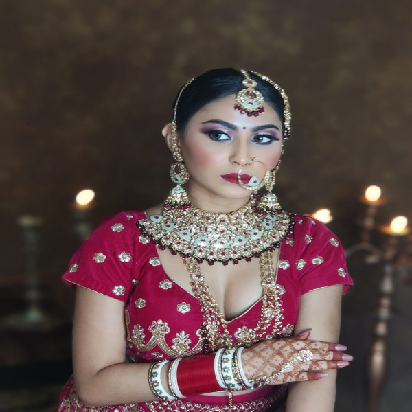 Red and gold jewellery set with Jhumka on rent